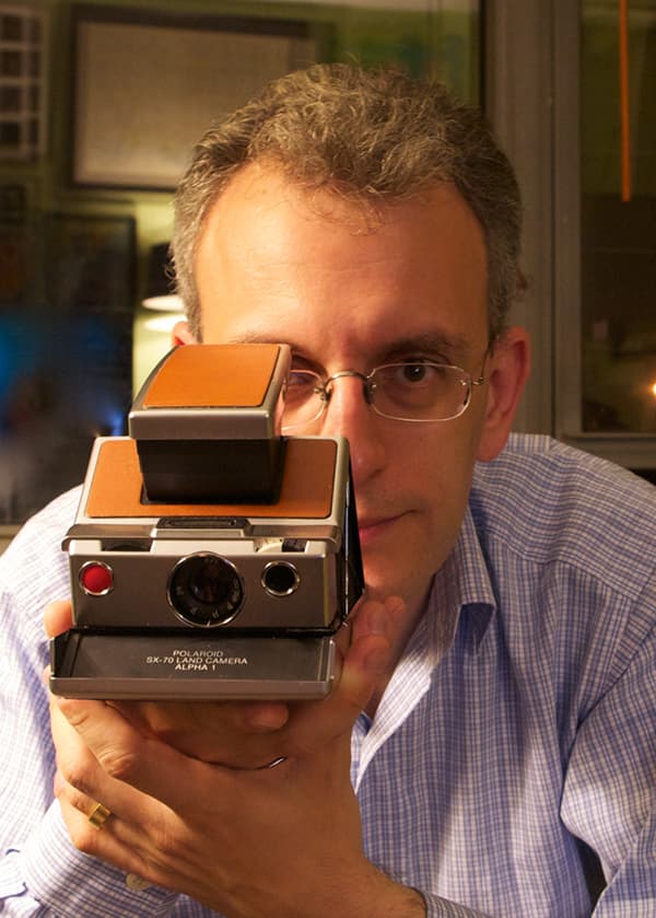 New York Magazine senior editor Christopher Bonanos with a Polaroid SX-70